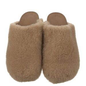•   Jenni Kayne Shearling Mules
•   Neutrals
•   Round-Toes
•   Platform